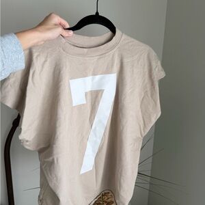Aritzia Tan T-Shirt with White Number 7 Shirt